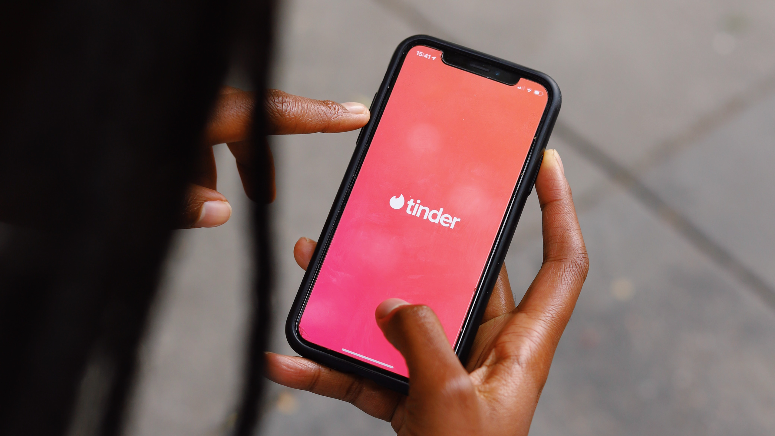 Photo of Tinder app open on iPhone