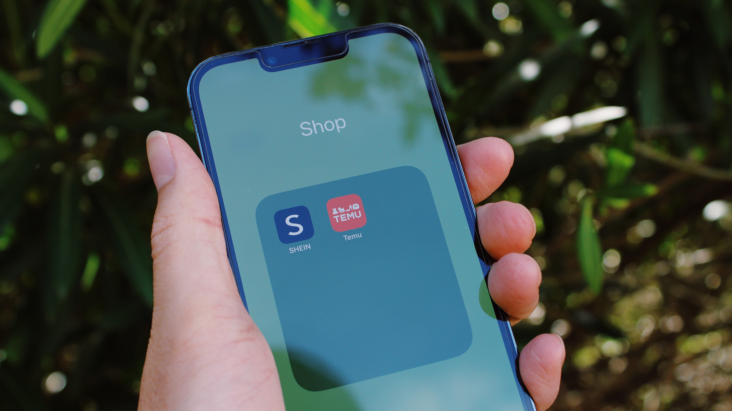 Photo of SHEIN and Temu app icons on phone