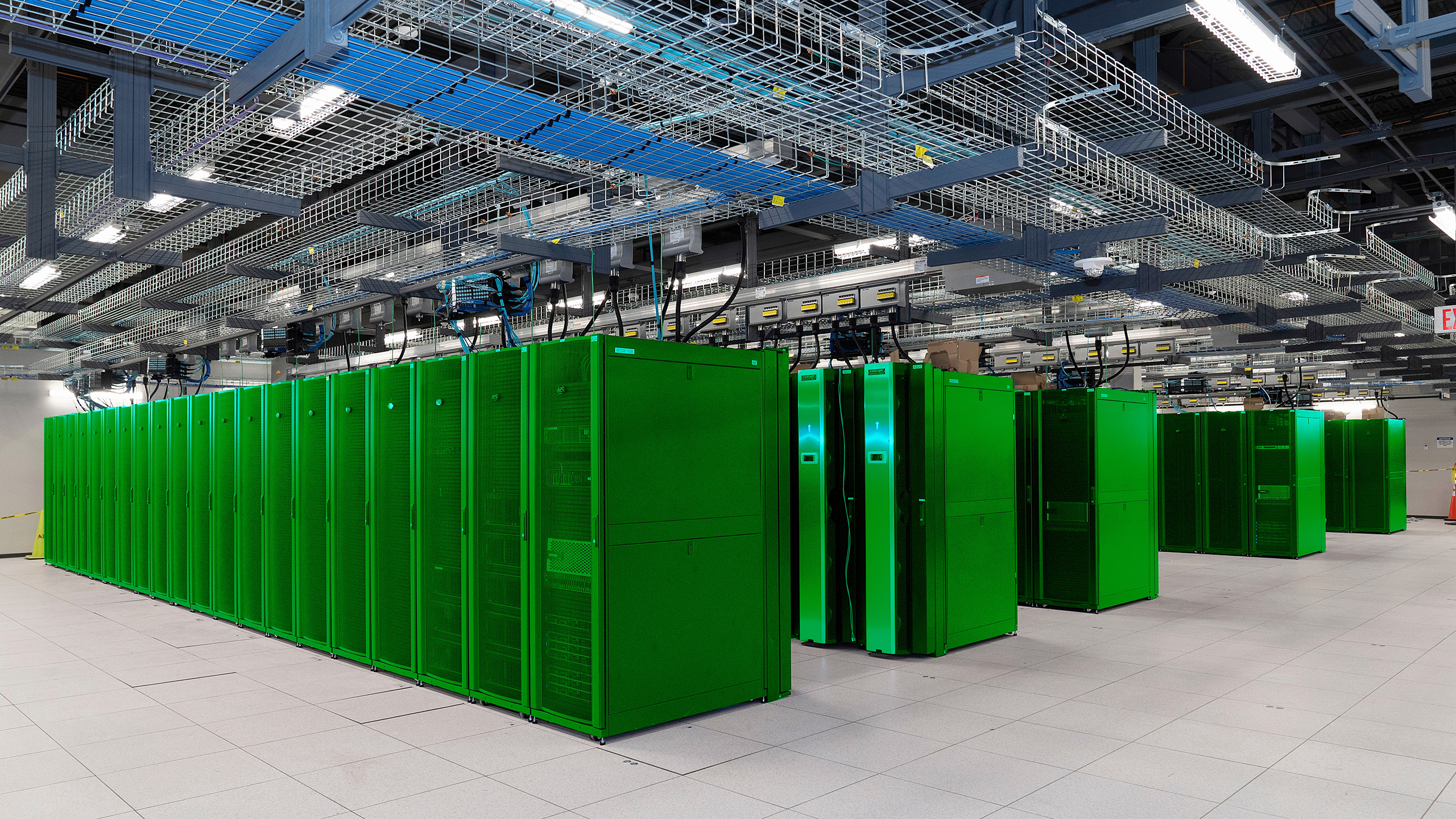 Photo illustration of a data center with server racks painted green