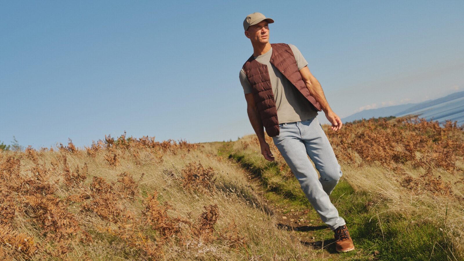 Photo of a person walking on a trail