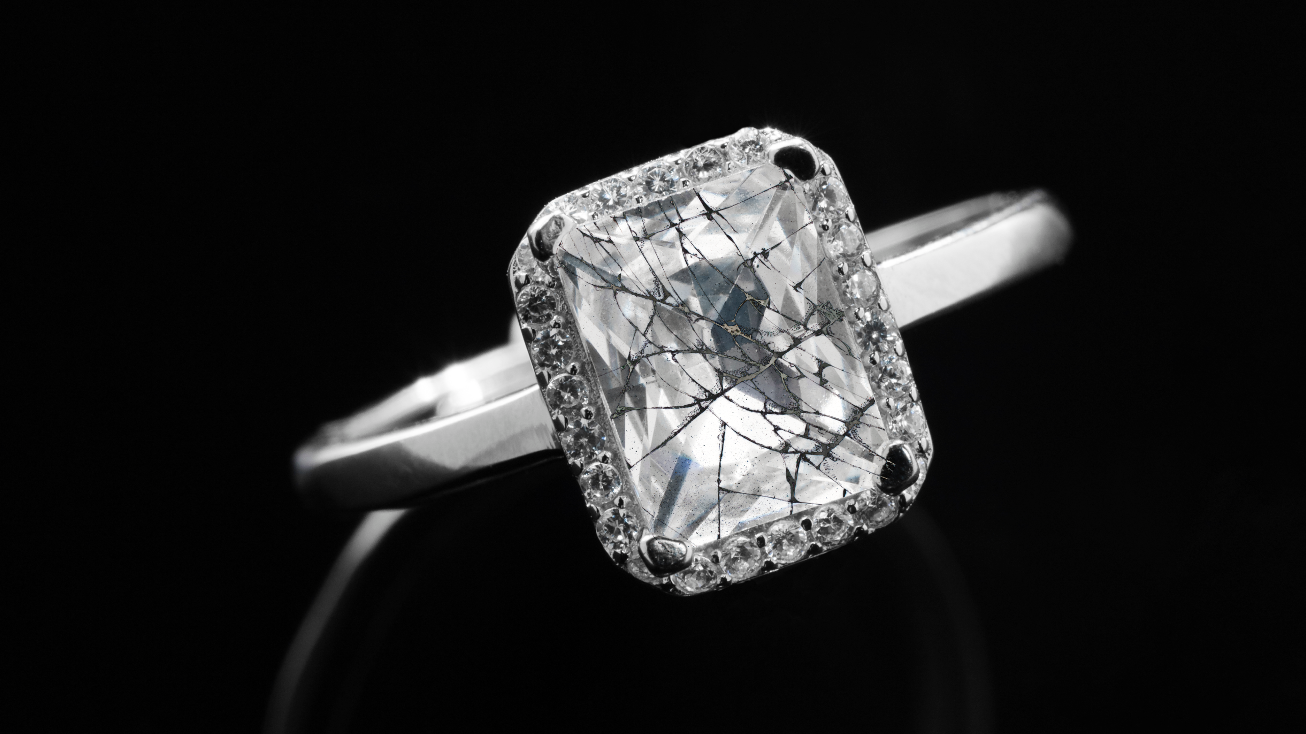 Photo illustration of a cracked diamond ring