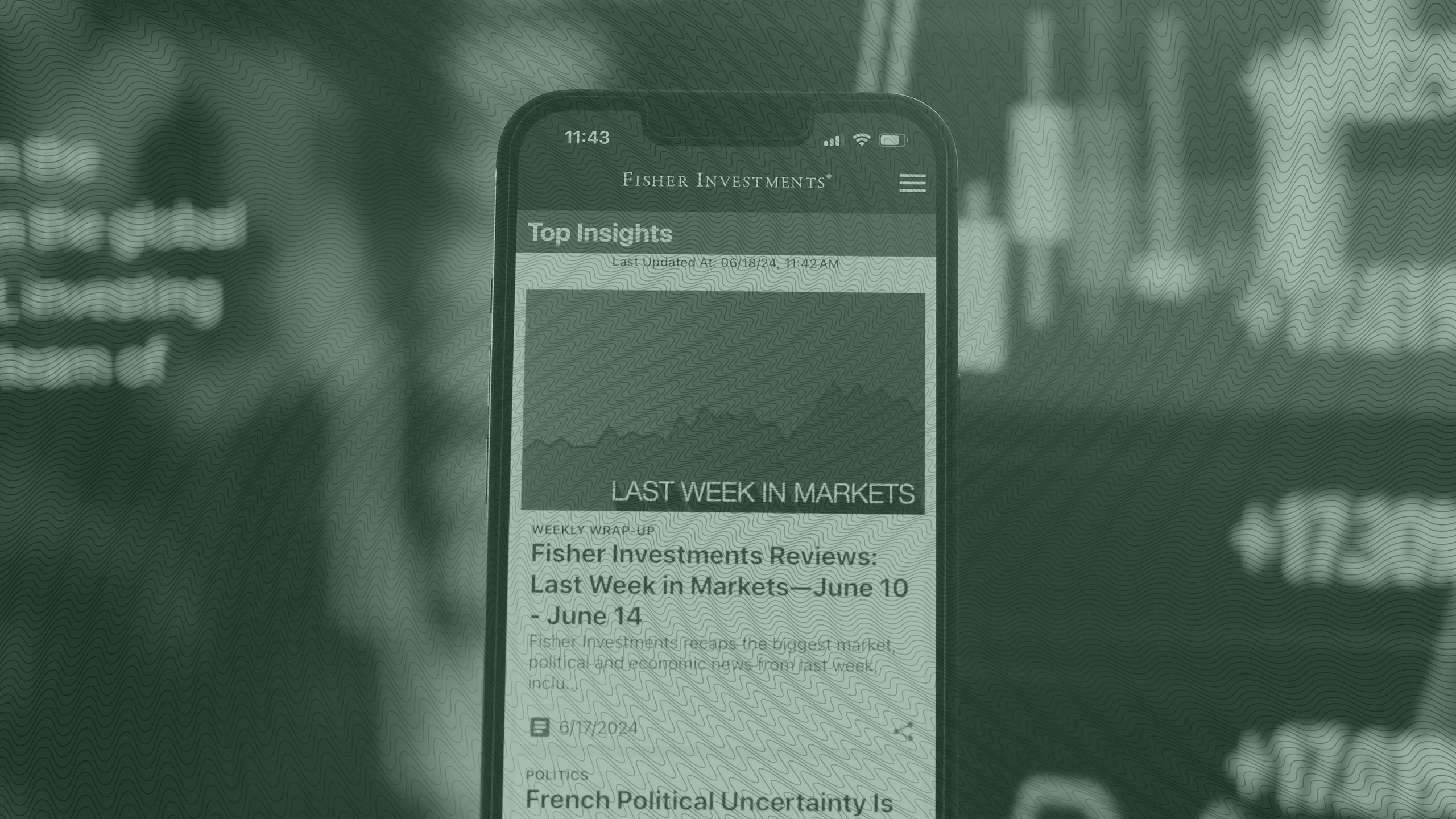Photo of the Fisher Investments app on an iPhone