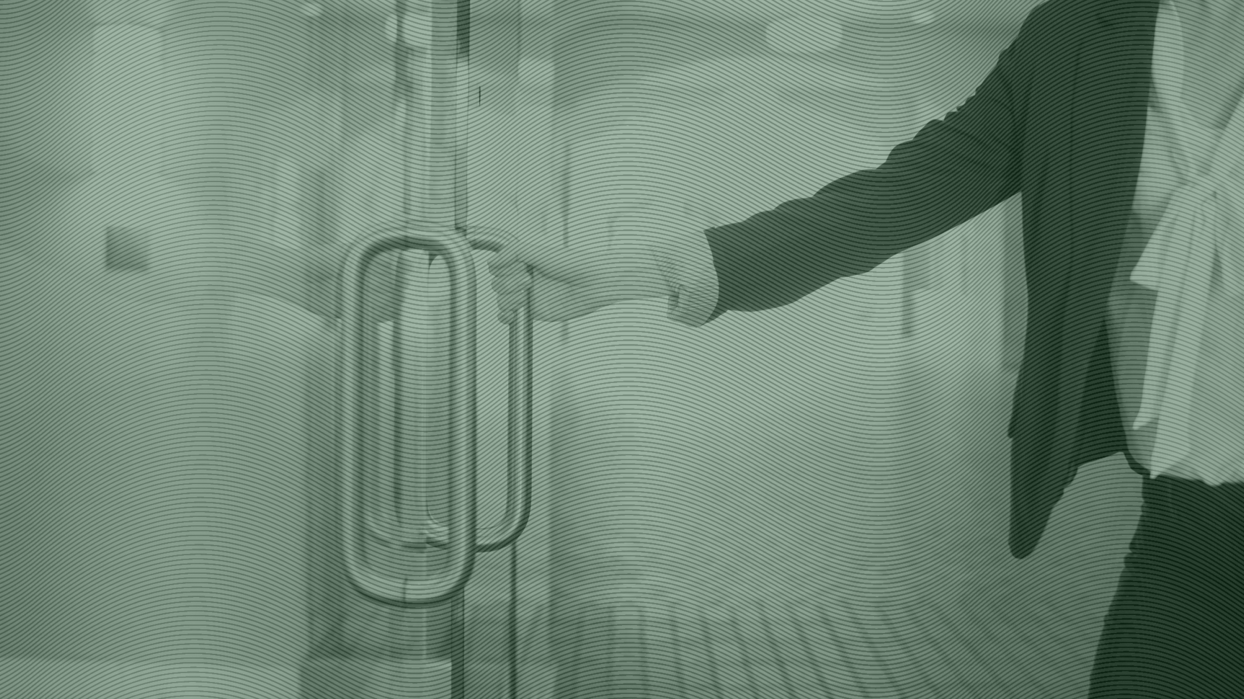 Photo of a business person opening an office door