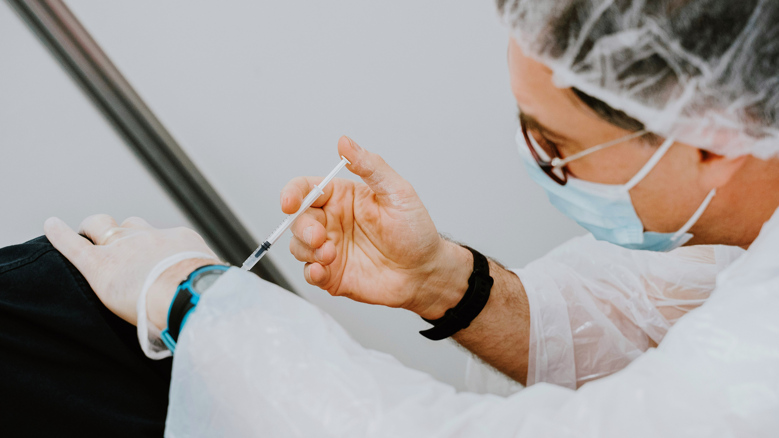 Photo of a nurse giving a vaccine