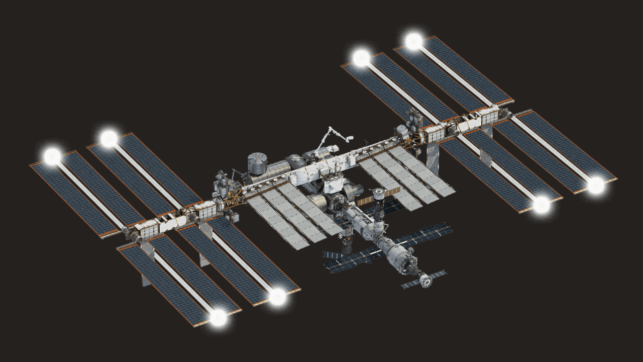 Photo illustration of the International Space Station with lights flickering off