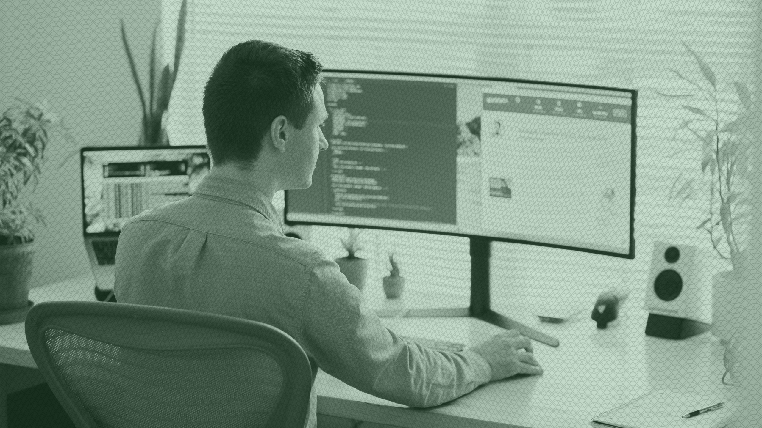Photo of a man working on a computer