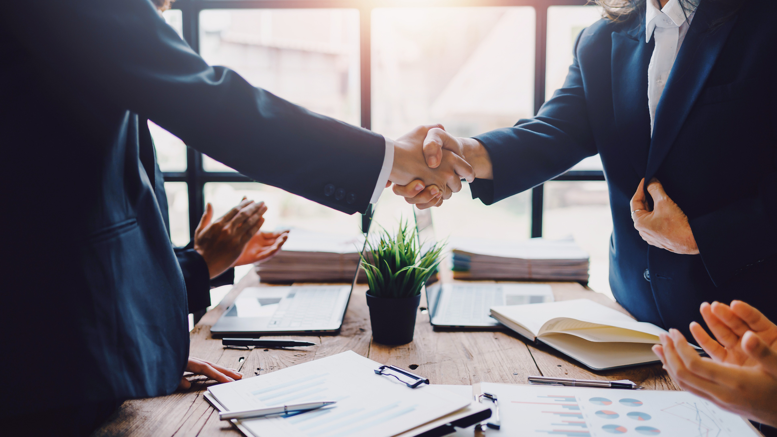 Photo of businesspeople shaking hands