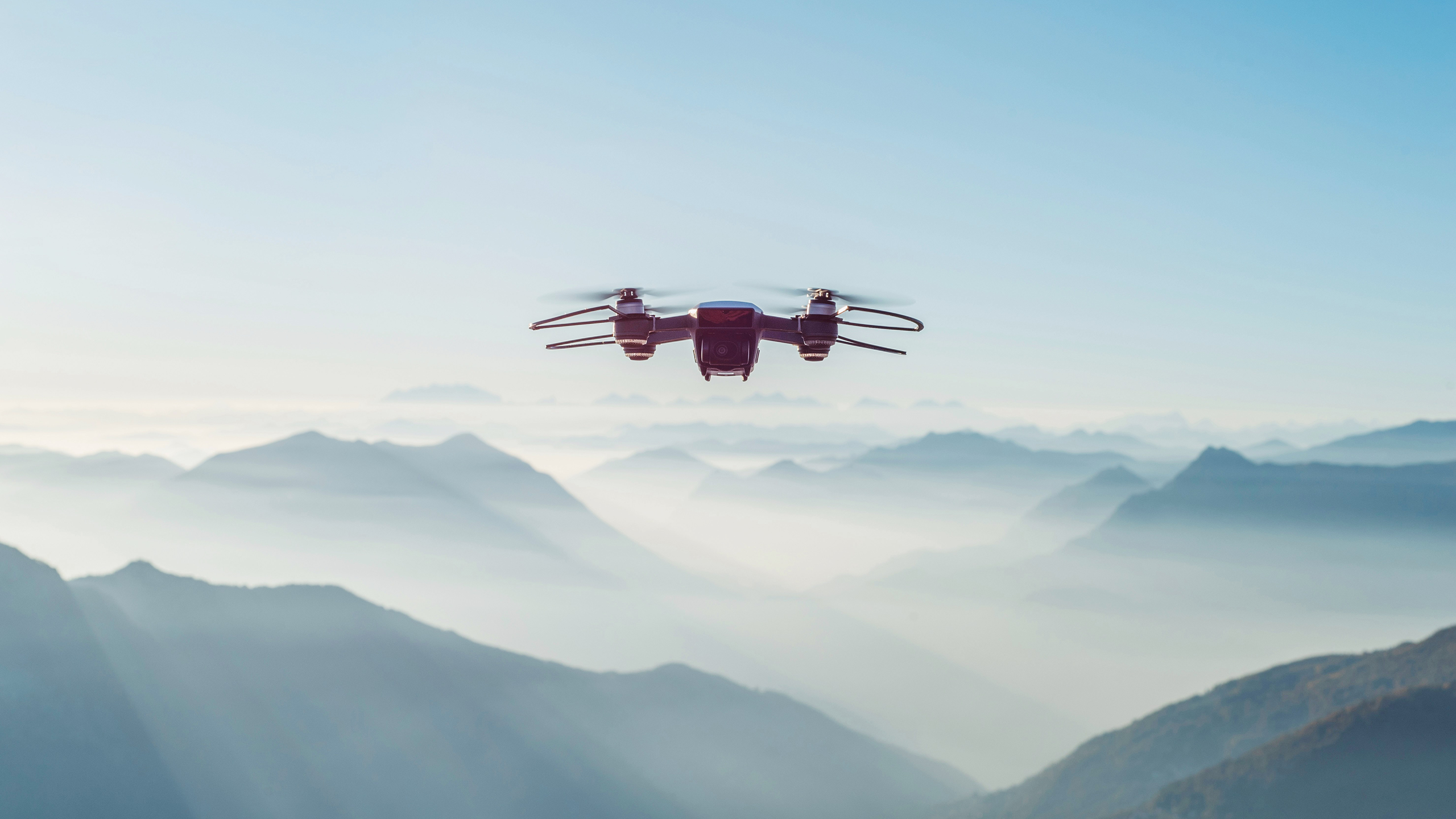 Photo of a drone flying in the sky