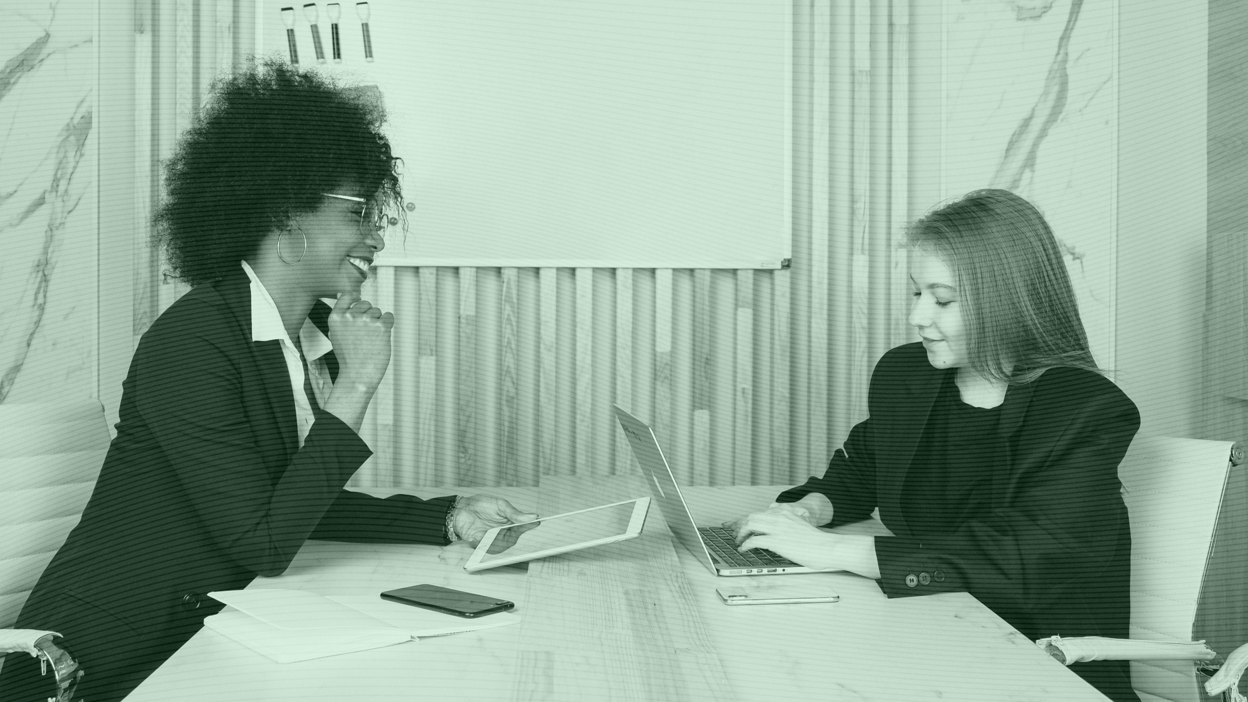 Photo of women in a client meeting