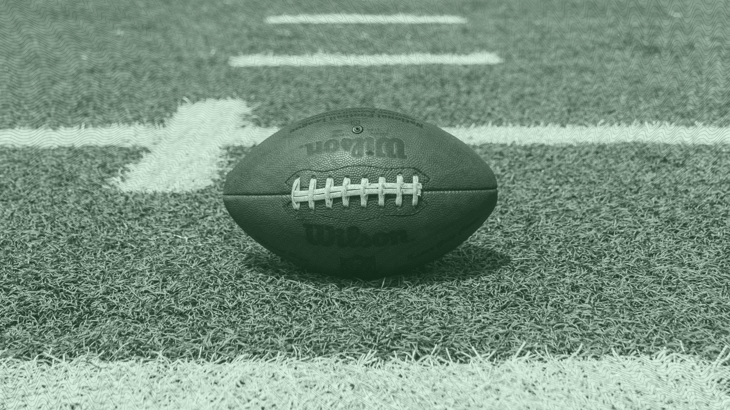 Photo of a football on a field