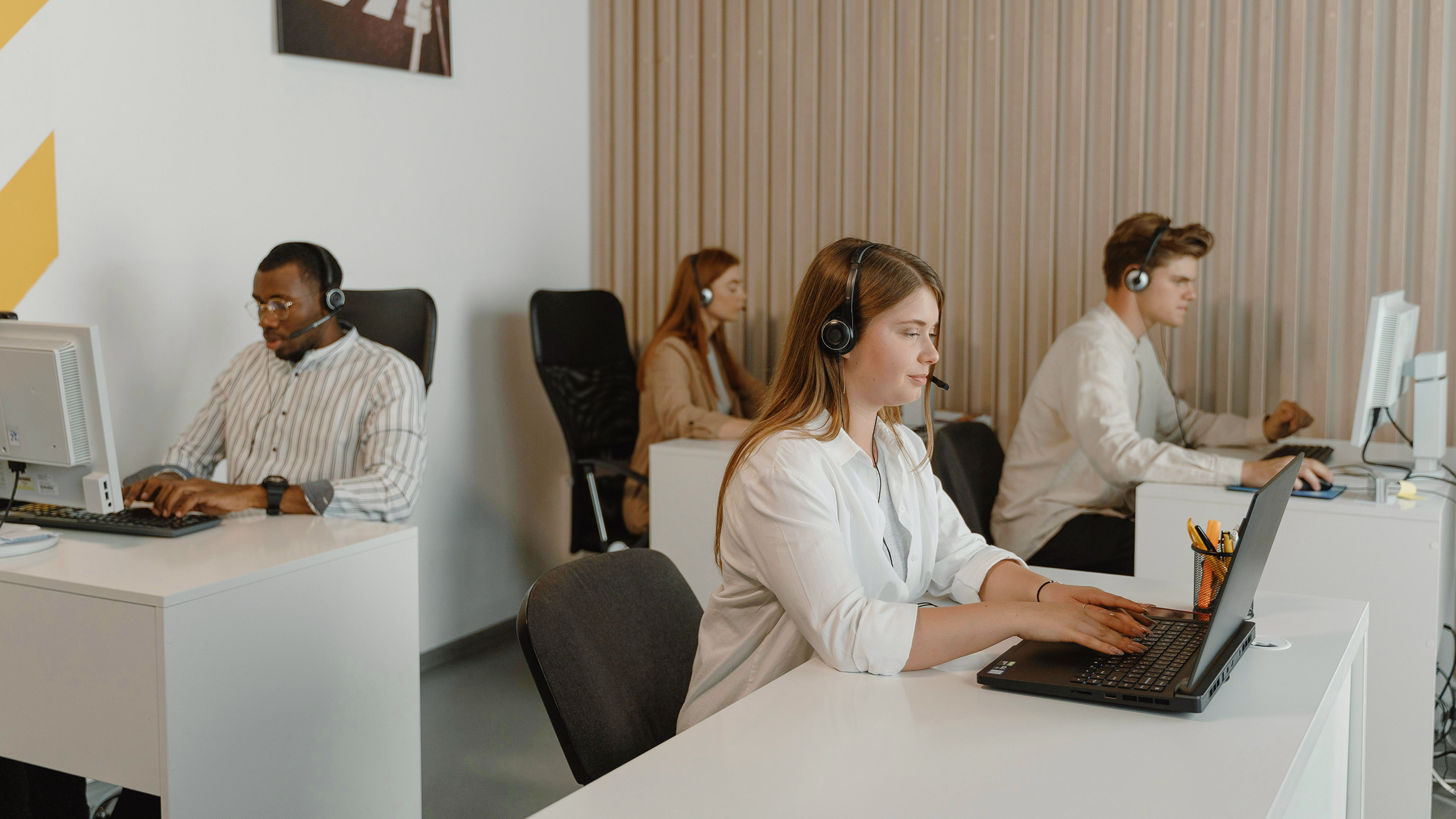 Photo of people in a call center