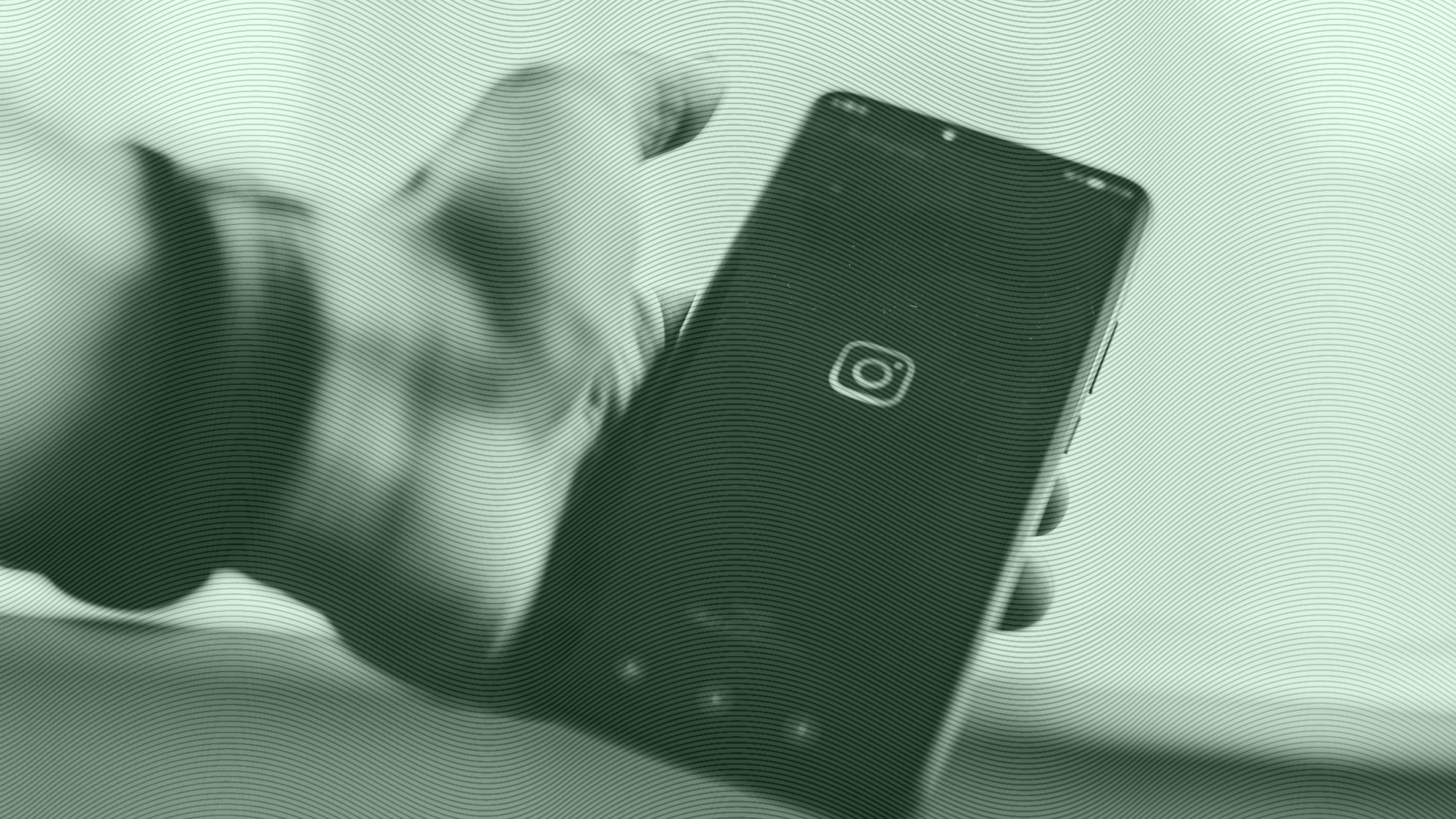 Photo of a person using Instagram on a phone