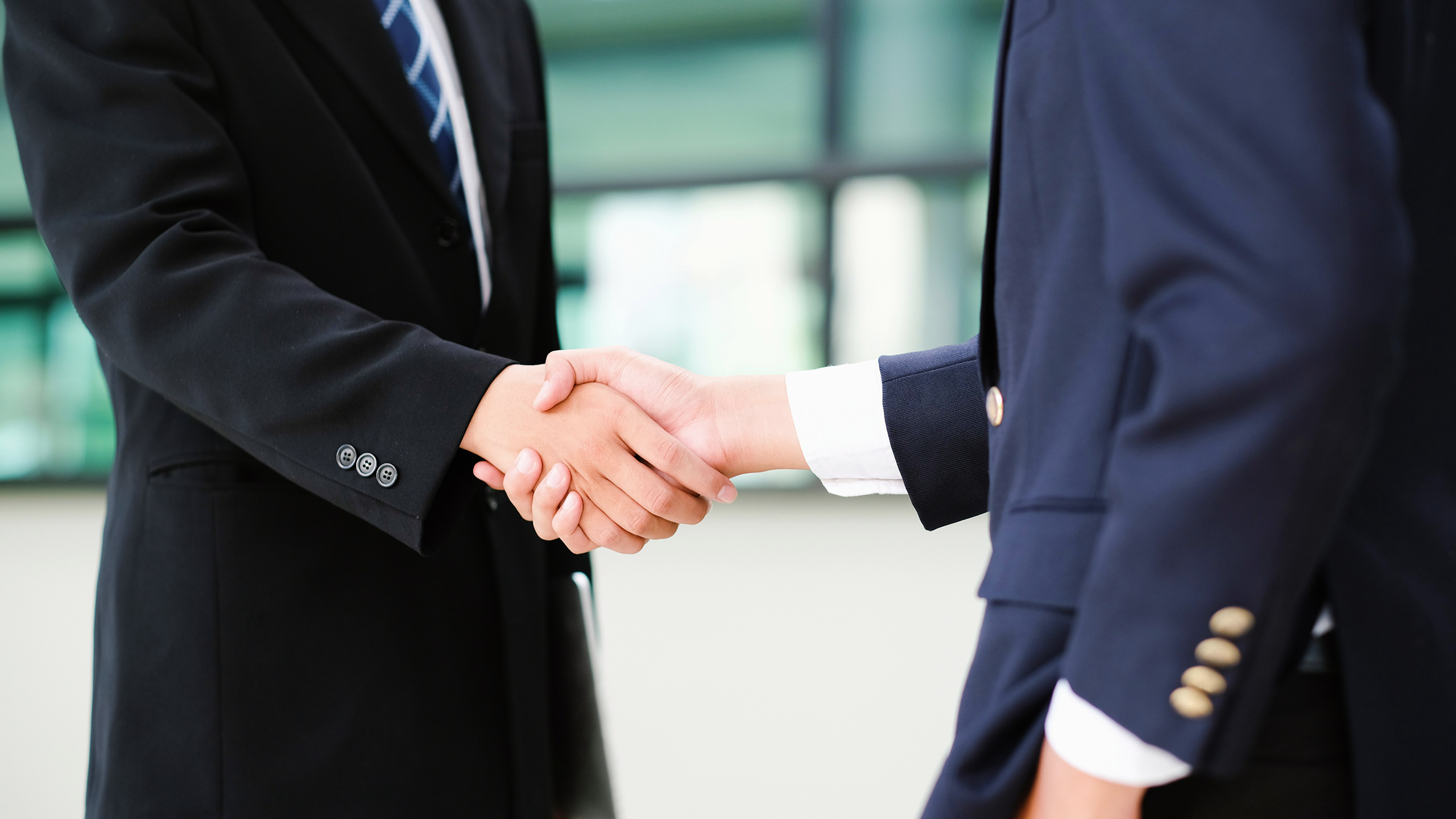 Photo of a business deal handshake