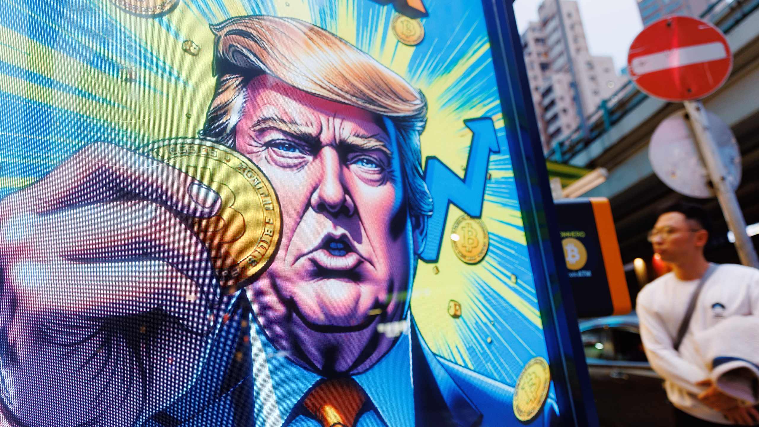 Photo of an advertisement featuring Donald Trump with Bitcoin