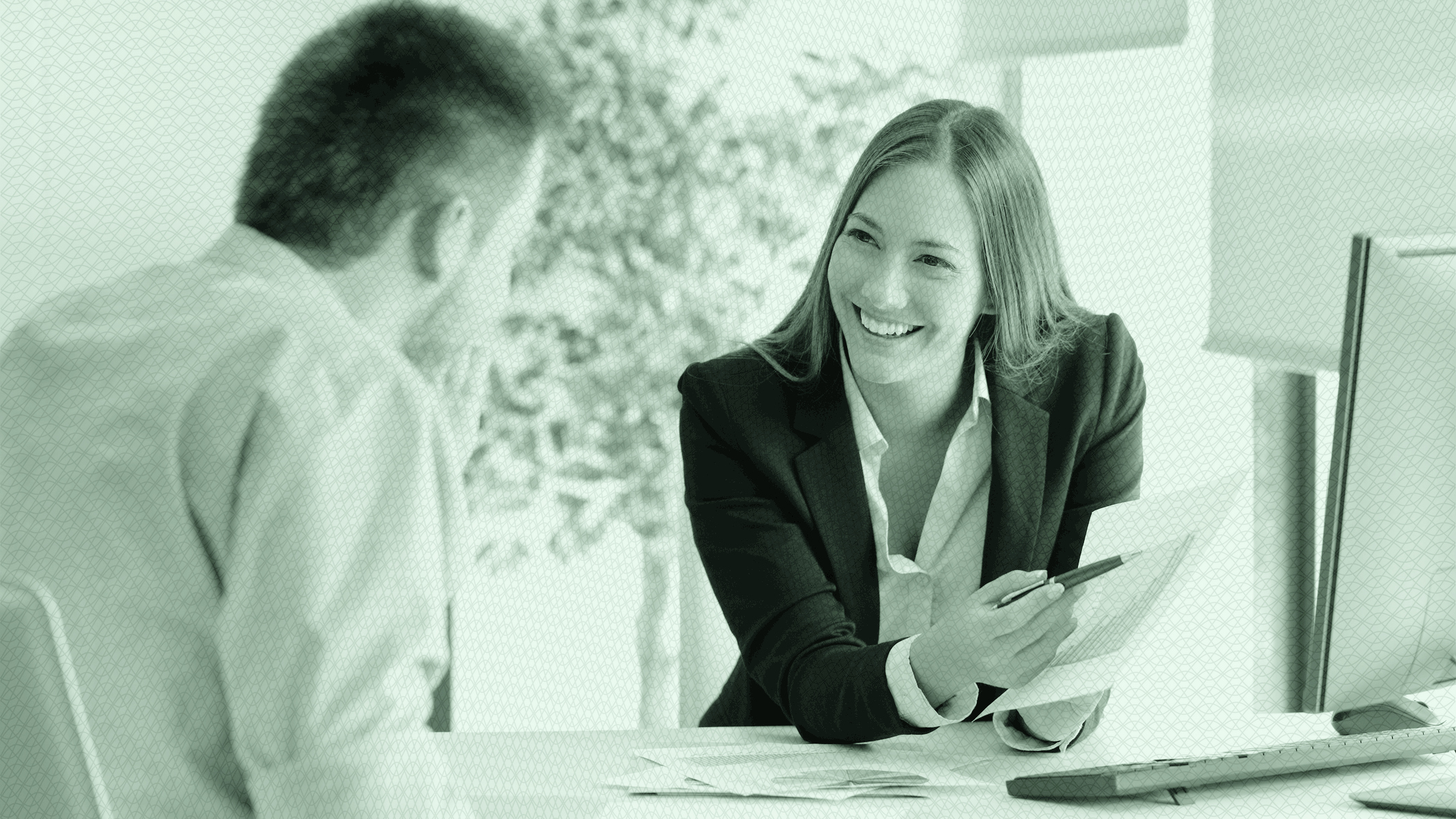 A business woman working with a male client.