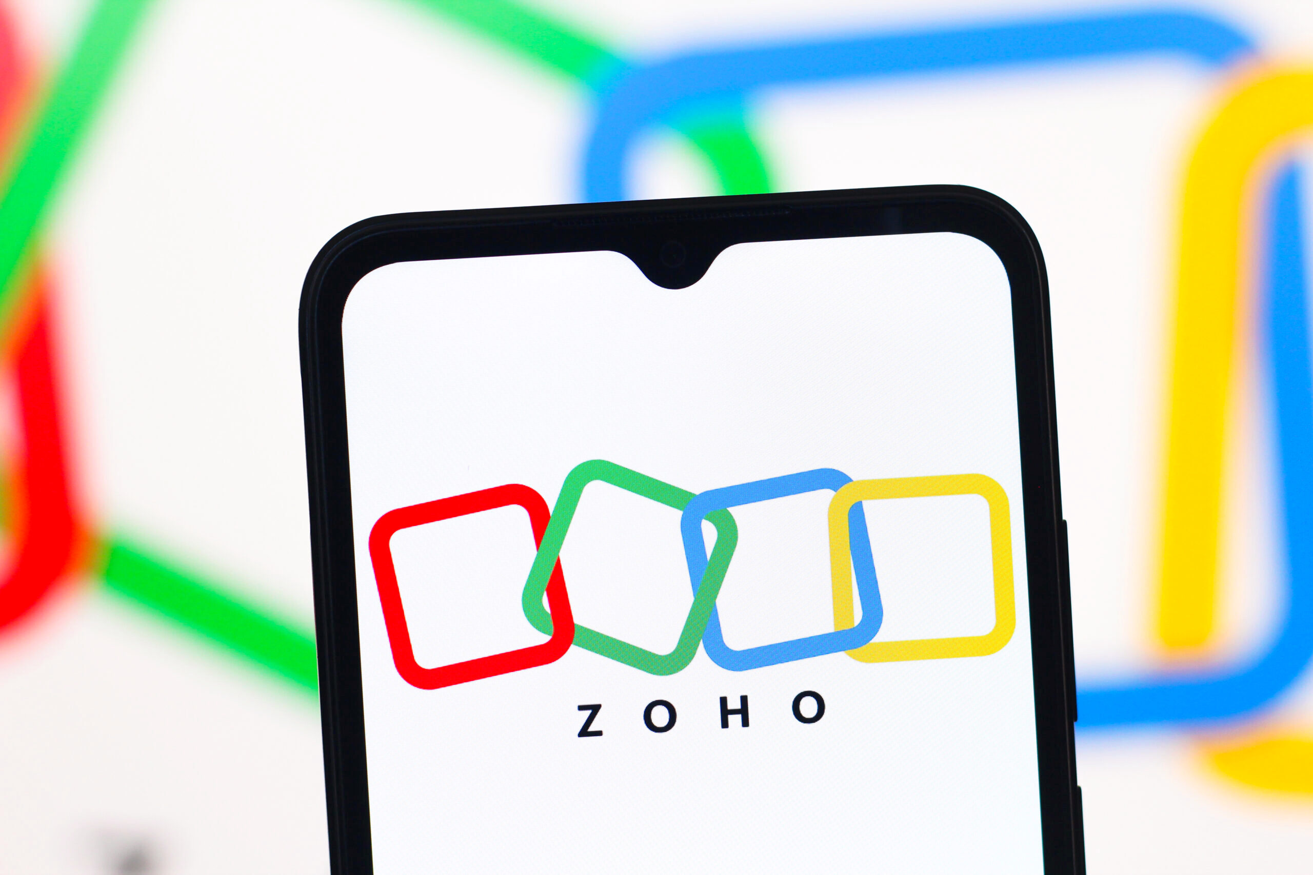 In this photo illustration, the Zoho Corporation logo is seen displayed on a smartphone screen. (Photo by Thomas Fuller / SOPA Images/Sipa USA) *** Strictly for editorial news purposes only *** (Newscom TagID: sipaphotostwentytwo000199.jpg) [Photo via Newscom]