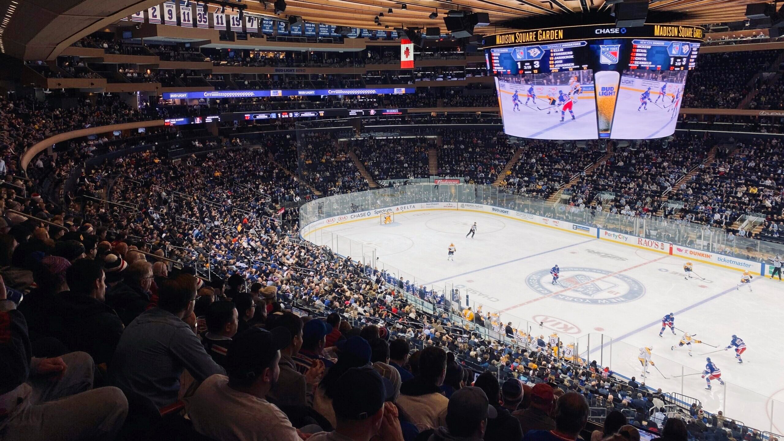 A view from inside New York City's Madison Square Garden shows the NHL's New York Rangers facing off against the Nashville Predators in an ice hockey game.