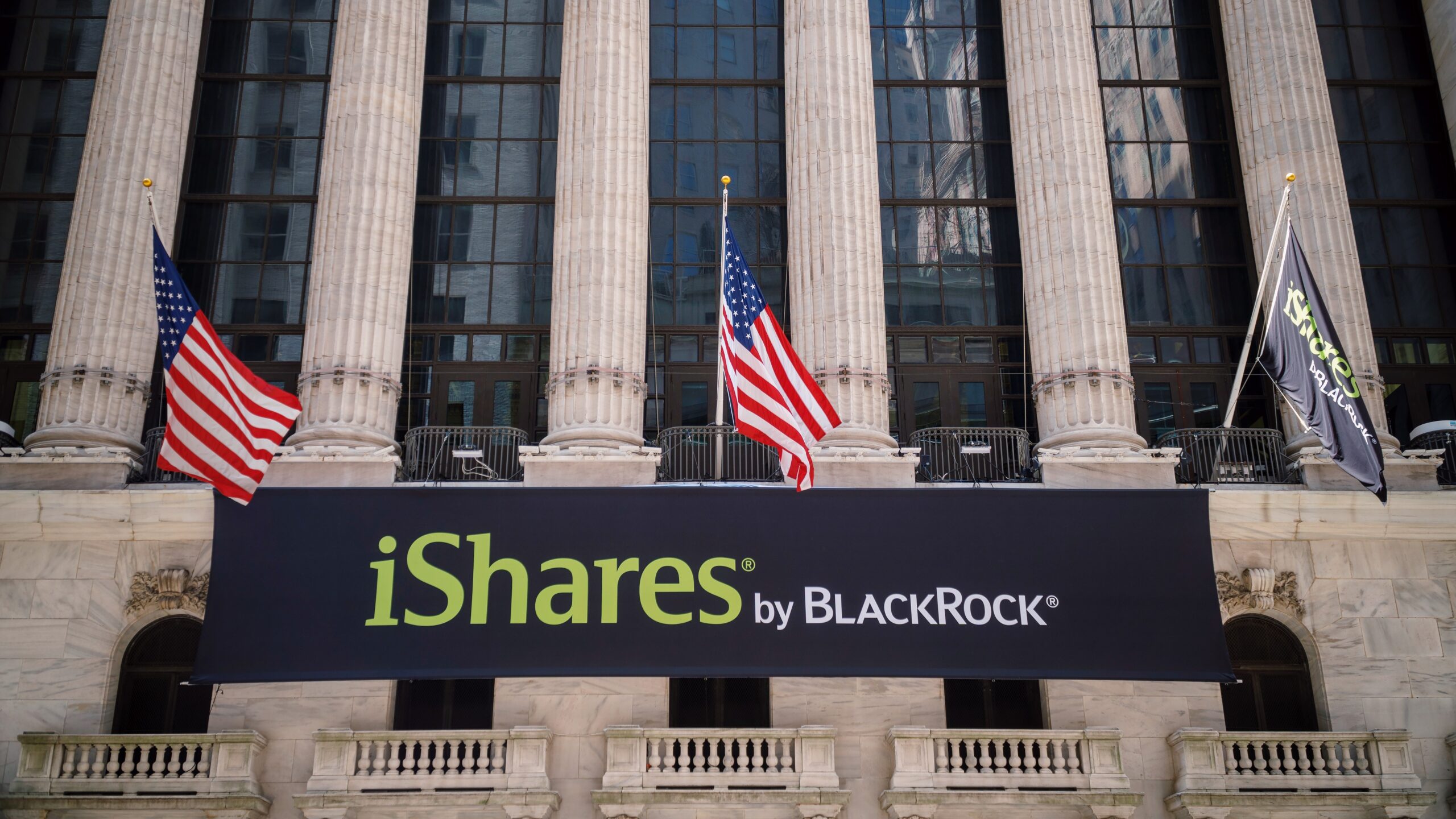 Photo of iShares by BlackRock banner hanging in front of the New York Stock Exchange