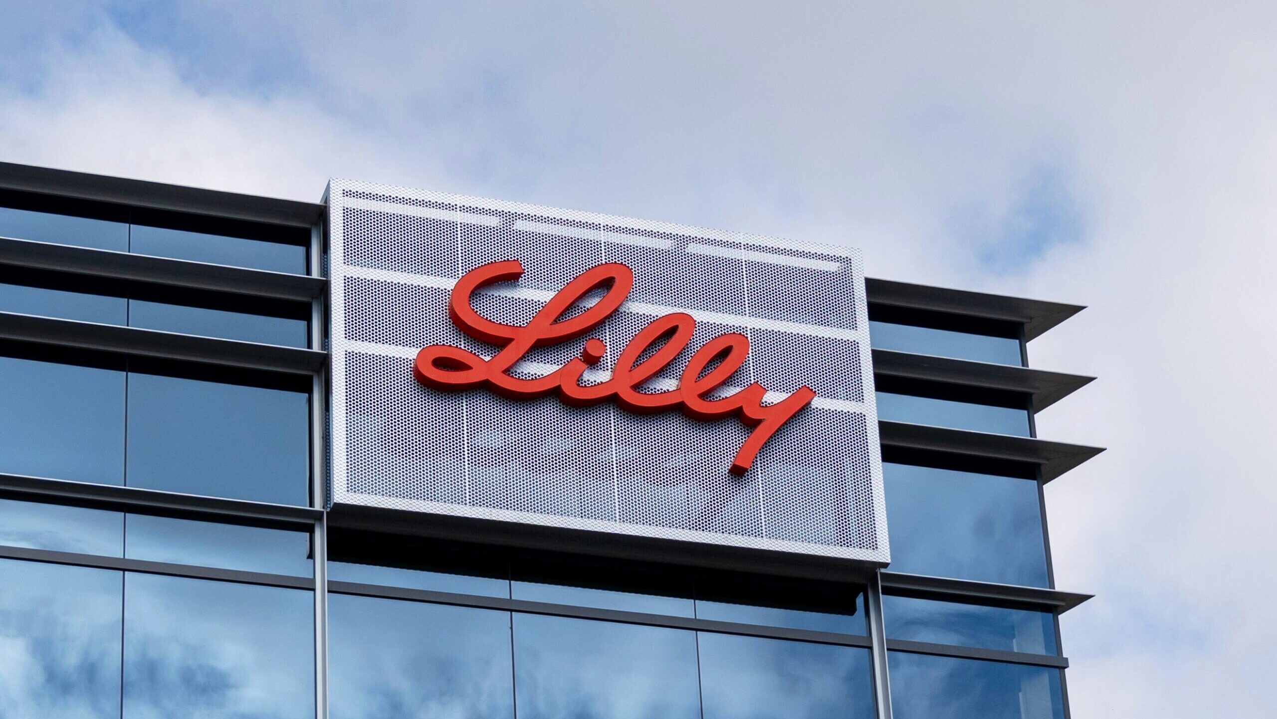 Photo of the Eli Lilly logo on an office building.
